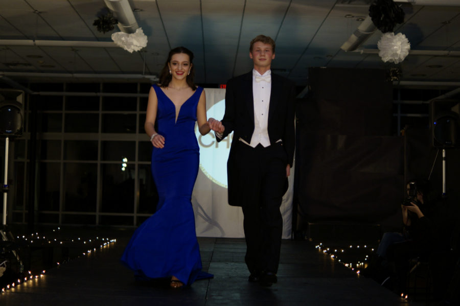 Students and faculty walk the runway for the third time at the annual Fashion Show