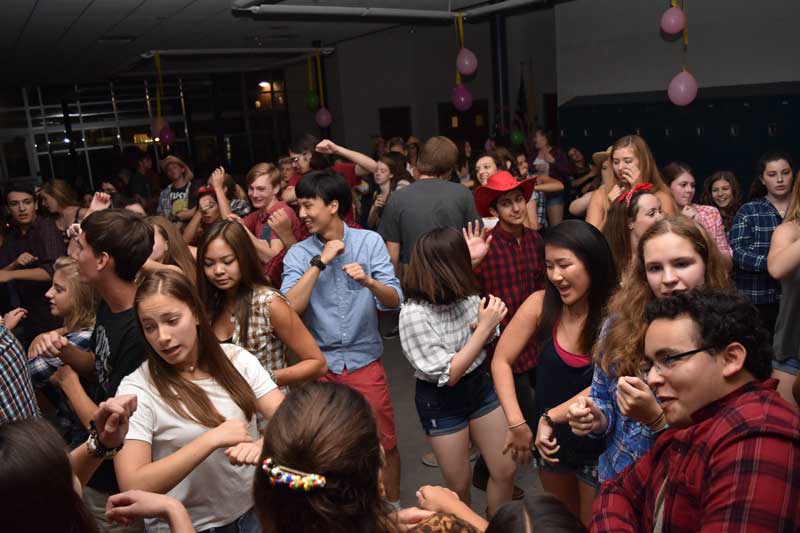 Students of all grades cut footloose at the back-to-school dance. 