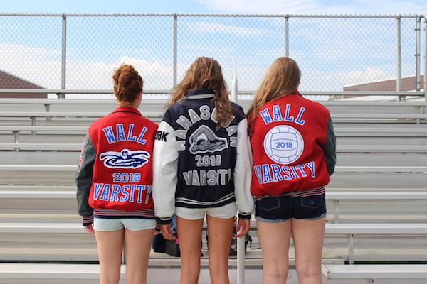 (From left) Erin Wren of Wall, Marie Schobel of Sea Girt and Megan Stanislowski of Wall in their varsity jackets.