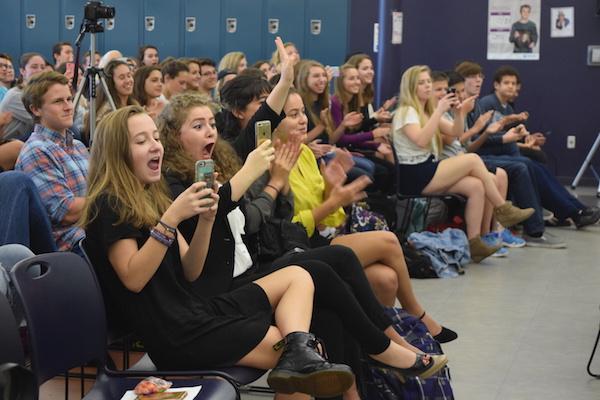 Students react to the candidates.