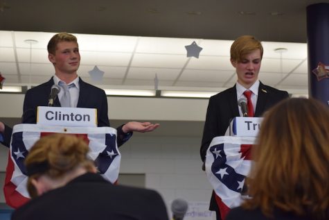 Hillary Clinton, represented by Matt Miller, and Donald Trump, represented by Jonathan Slovak, debated hot topics from immigration to college debt.