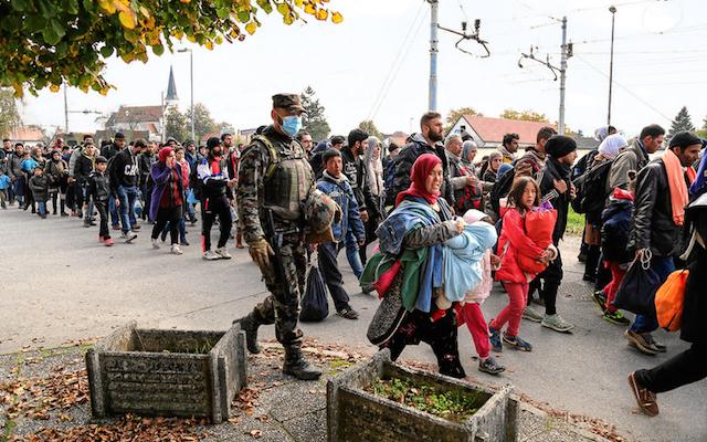 Syrian refugees and migrants pass through Slovenia.