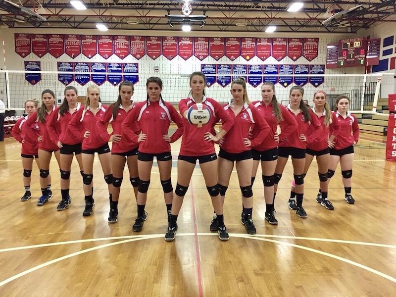 Junior Megan Stanislowski of Wall is on her home high schools volleyball team