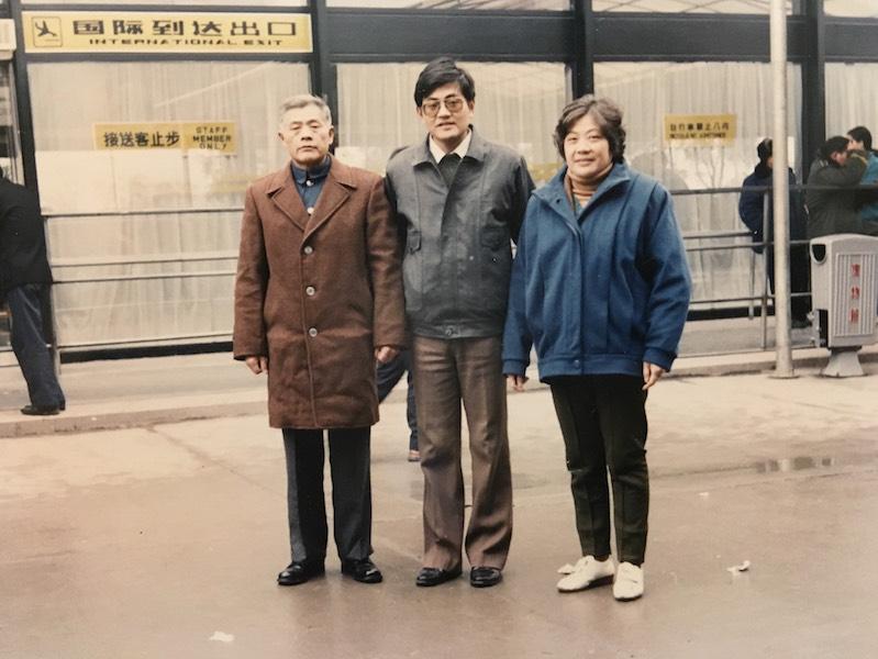 Sophomore Sebrina Gaos father, age 28, with his parents at the airport on January 19, 1991, the day he left China to come to America to study bioengineering at NJIT.