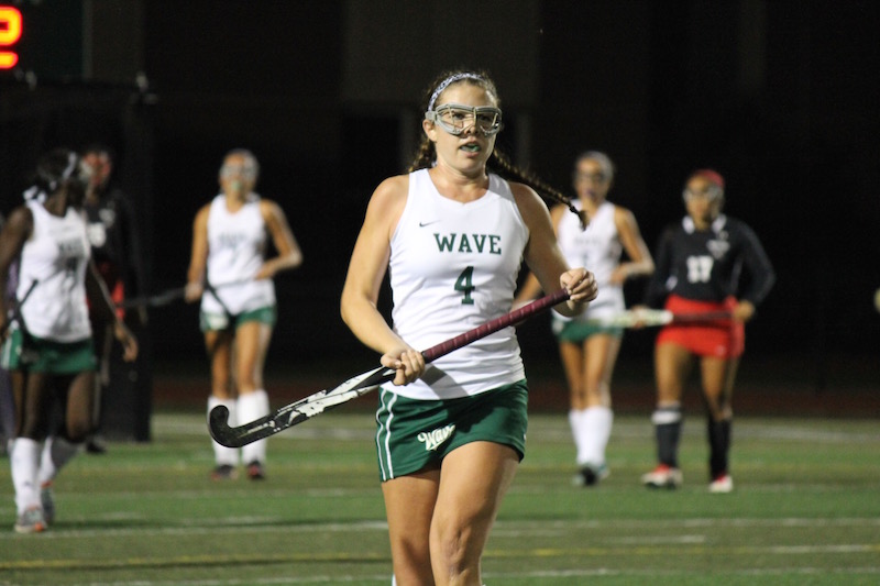 In+addition+to+playing+varsity+field+hockey%2C+senior+Riley+Mullan+of+Long+Branch+plays+lacrosse+for+the+Green+Wave.