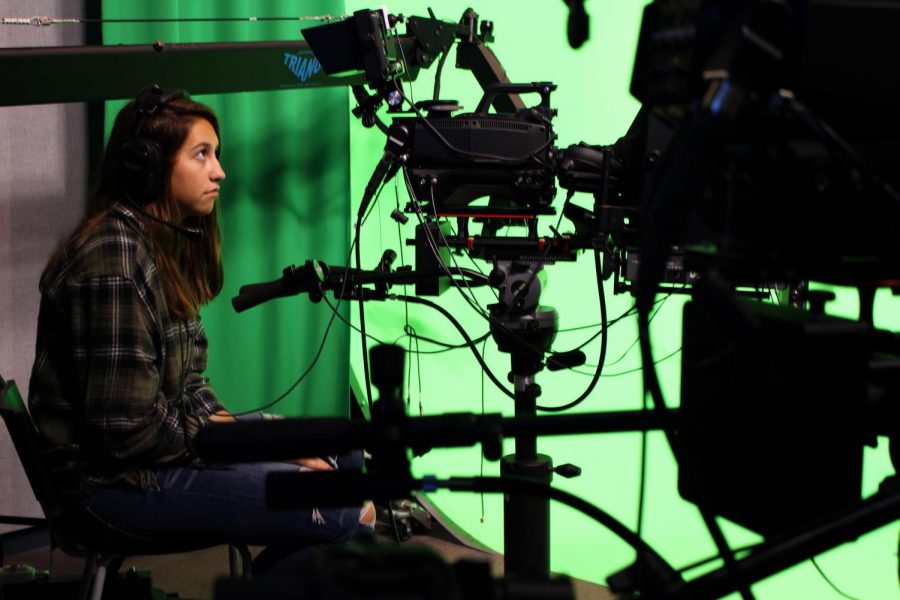 While rehearsing for CHS’s live morning show “Views From the Studio,” junior Kate Dickenson of Spring Lake Heights listens to her classmates’ directions as the bell nears and they prepare to go live for a five minute broadcast to the school.