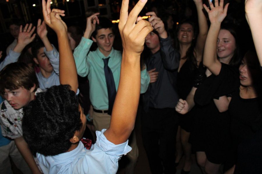 Students+danced+to+hits+by+artists+such+as+Nicki+Minaj+and+Pitbull+at+the+first+ever+homecoming+dance.