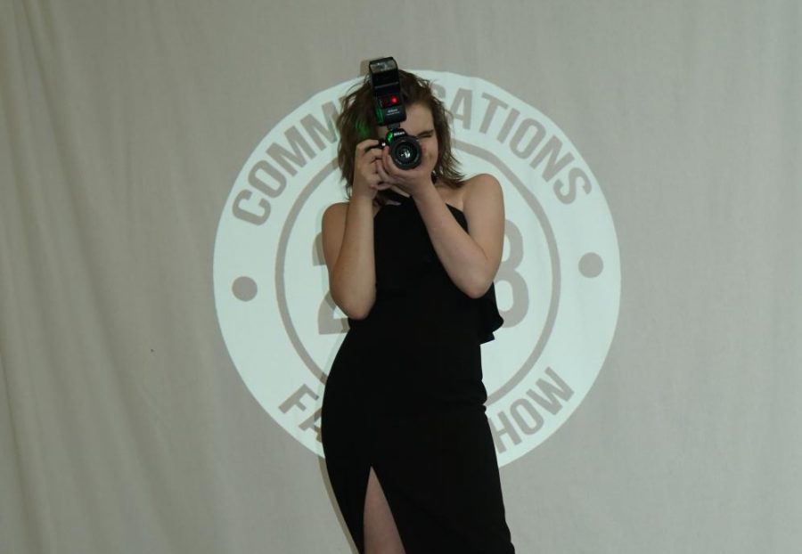 Rasp shows off her love for photography on the CHS runway.