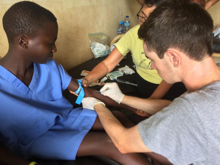 Senior Connor Martin of Spring Lake Heights learned various ways to treat injured patients during his service trip to Africa.
