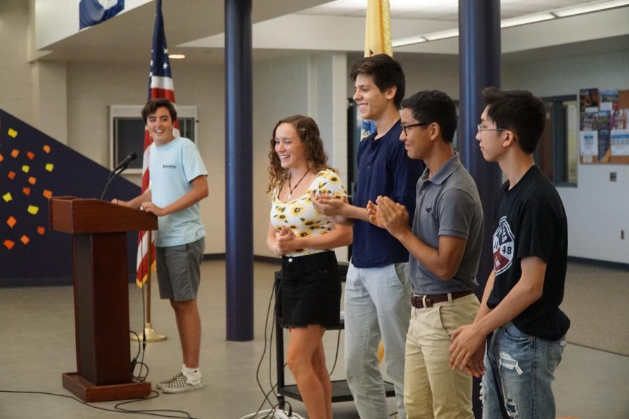 Senior and SGA President Liam Marshall, left, announces the rest of the 2018-19 SGA: senior and Vice President Emma Hecht of Wall and junior council members Dane Tedder of Ocean, Evan Kuo of Tinton Falls and Liam Jamolod of Howell. 