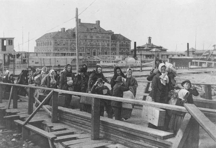 Immigrants entering the United States through Ellis Island in 1902.
