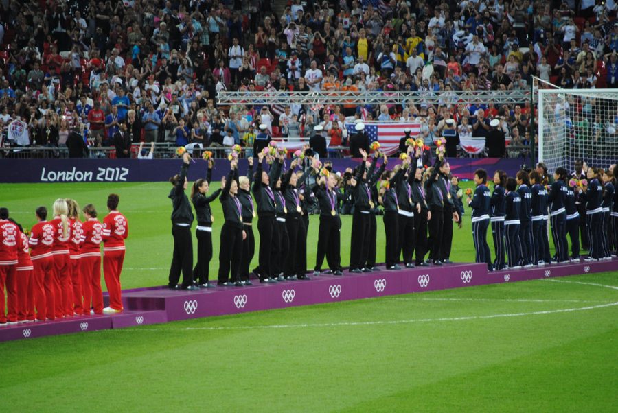 The US Womens National Team, center, raises their gold medals at the 2012 Olympics.
https://creativecommons.org/licenses/by/2.0/
