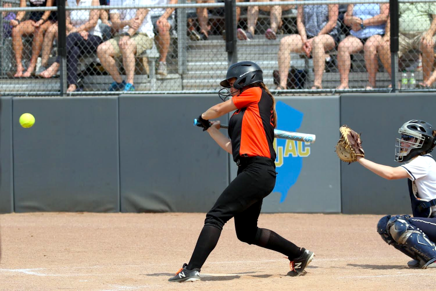 Turner prepares to hit a softball during one of her games.