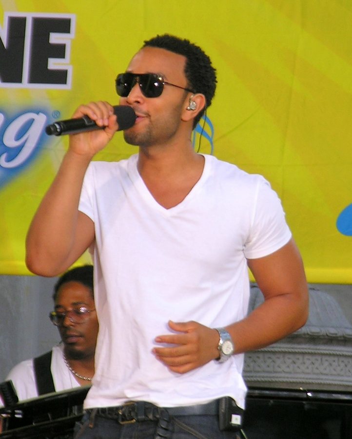 Musician John Legend preforming live at a concert.  https://creativecommons.org/licenses/by/2.0/