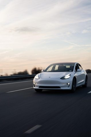 Electric cars are environmentally friendly but are not accessible to the public. https://unsplash.com/license