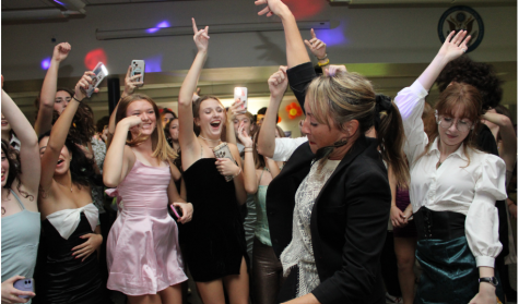 Spanish teacher Courtney Van Arsdale and students dance the night away at the fairytale-themed Homecoming dance on Friday, Nov. 4. 