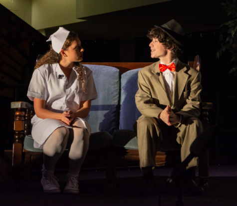 Freshman Izzy San Filippo (left), playing Nurse Ruth Kelly, sits and talks with
junior Justin Longo’s Elwood P. Dowd at a Drama Club dress rehearsal of Harvey.