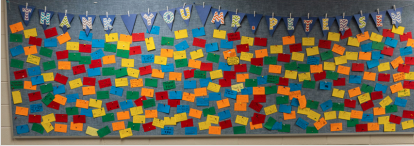 The bulletin board of index cards thanks Mr. Petersen.