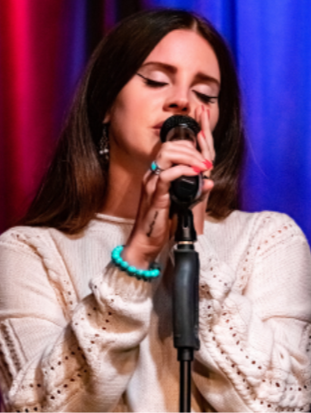 Lana Del Rey, pictured above at the Grammy Museum, is a topic of study for students at NYU.“Lana Del Rey @ Grammy
Museum 10/13/2019” by jus10h is licensed under CC BY 2.0.