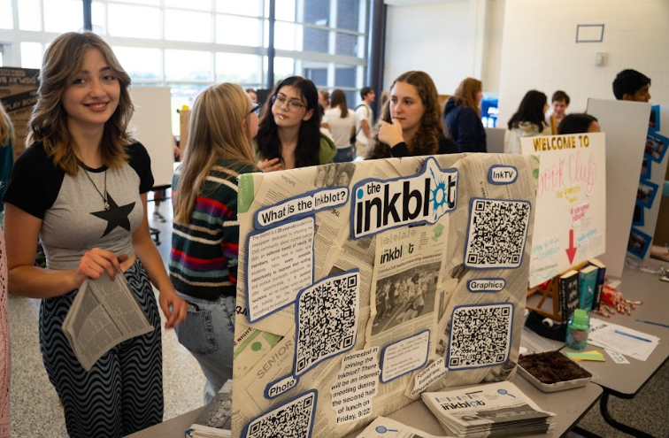 The Inkblot welcomes new writers with a copy of the Inkblot as well as a sweet treat at the annual Communications club fair.