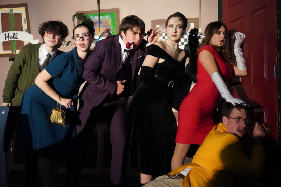 The cast of “Clue: On Stage” performs on opening night.



