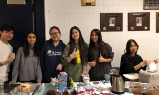 Li volunteers at bake sale with fellow Phase Tw0 members at Marlboro High School on Nov. 18 2023