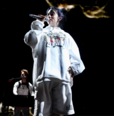 Billie Eilish performs at Red Rocks Ampitheatre. “Billie Eilish Red
Rocks 06.05.19 (48012827583)” by Julio Enriquez from Denver,CO, USA is licensed under CC BY 2.0.