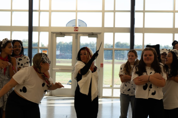 Seniors preform as 101 Dalmatians in the annual Halloween parade.