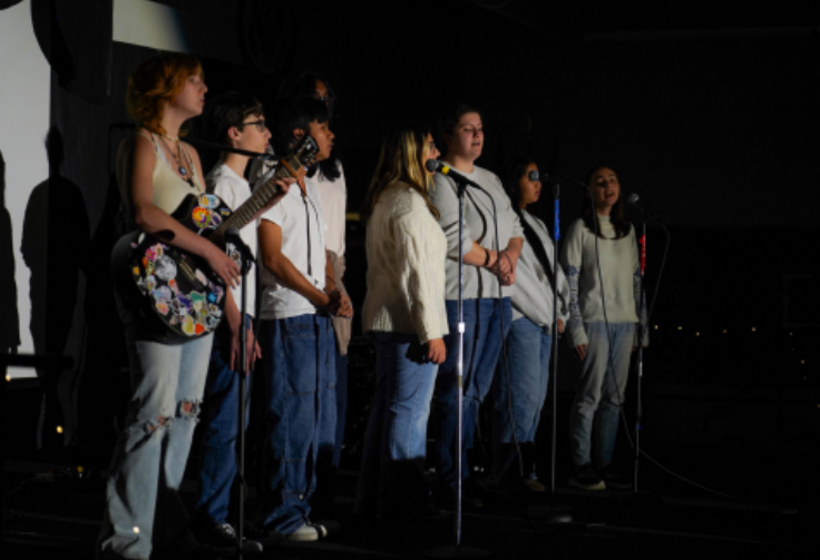 CHS’s Choir Club performs “Can’t Catch me Now” by Olivia Rodrigo at the 2024 Coffeehouse hosted by the junior class.