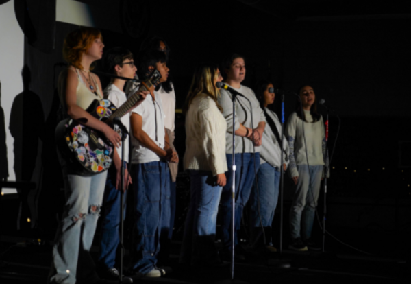 CHS’s Choir Club performs “Can’t Catch me Now” by Olivia Rodrigo at the 2024 Coffeehouse hosted by the junior class.