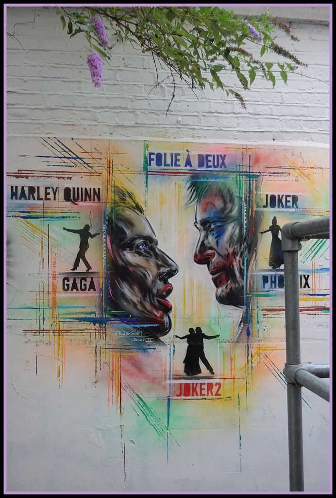 London street art depicts characters from “Joker: Folie à Deux.” “‘Joker 2’ preview in Surbiton South London” by Loco Steve is licensed under CC BY-SA 2.0.